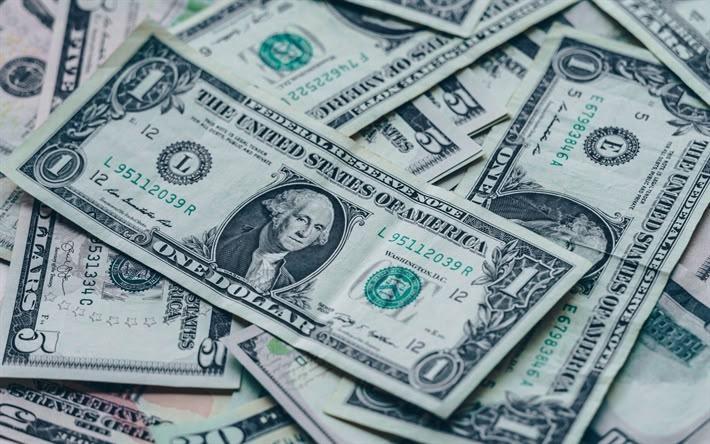 الدولار قرب أدنى مستوى في أسبوعين مع تراجع التوقعات برفع أسعار الفائدة