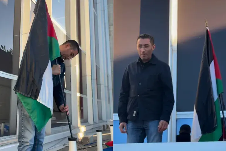 عمدة بلدية فينيسيو الفرنسية يرفع علم فلسطين على واجهة البلدية