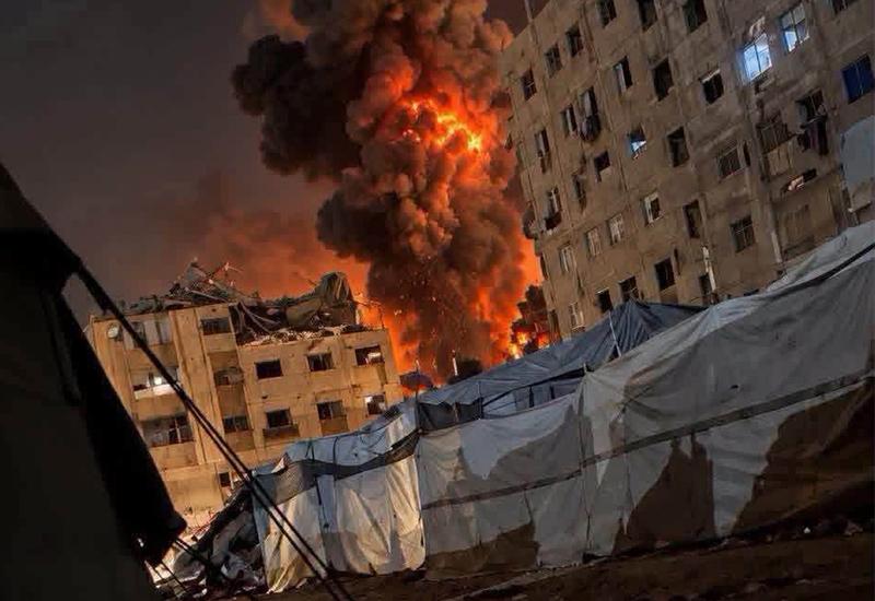 شهيدة ومصابون وقصف مدفعي متواصل في قطاع غزة