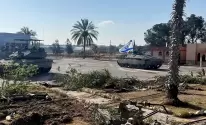 دبابات-إسرائيلية-عند-الجانب-الفلسطيني-من-معبر-رفح-1716534047.webp