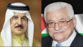 عباس والعاهل البحريني