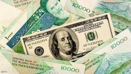الريال الإيراني يهوي أمام الدولار ويتراجع لمستوى قياسي