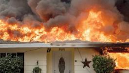 الحرائق تلتهم المنازل بمقاطعات كاليفورنيا وتحذير من أمطار غزيرة وفيضانات.jpg