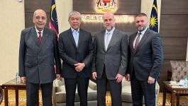 الهباش ونائب رئيس الوزراء الماليزي