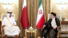 أمير قطر يدعو الرئيس الإيراني لزيارة الدوحة.jpg