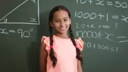 portrait-of-smiling-mixed-race-schoolgirl-standing-2023-11-27-05-00-48-utc_0.jpg.webp