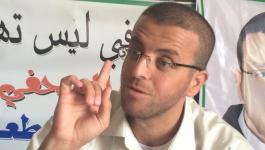 الصحفي محمد القيق يتنسم الحرية.jpg