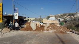 قوات الاحتلال تُغلق طرق فرعية في بلدة حوارة بالسواتر الترابية