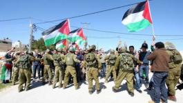 الاحتلال يقمع مسيرة سلمية في حلحول منددة بقرار ترمب بشأن القدس.jpg