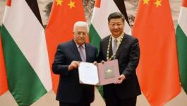عباس والرئيس الصيني