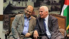 أبو مرزوق وعزام الأحمد