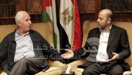 موسى أبو مرزوق وعزام الأحمد 