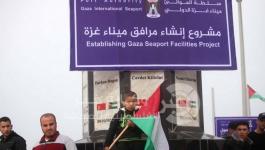 طفل-علم-فلسطين-ميناء-غزة