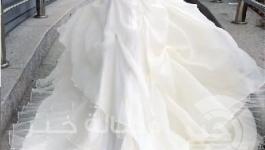 يزين الذيل فستان الزفاف