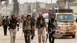 عناصر من المعارضة المسلحة في إدلب