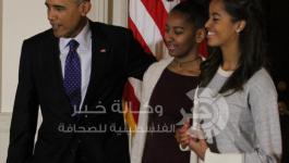 الرئيس الأمريكي باراك أوباما وابنتيه 