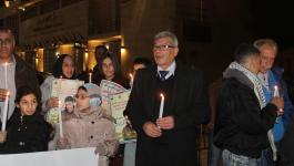 وقفة إضاءة الشموع مع الأسرى في ساحة كنيسة المهد