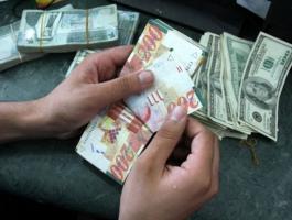 الاقتصاد تشرع بإنشاء دائرة لتنظيم محلات الصرافة في غزة