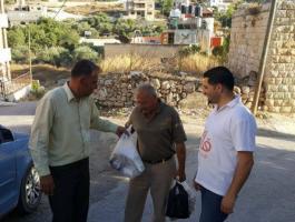 فتح توزع مساعدات رمضانية على الأسر المحتاجة في سلفيت