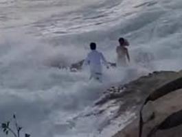 بالفيديو والصور: موجة عملاقة تفسد فرحة عروسين