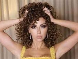 ظهور مفاجيء لميريام فارس بالمايوه
