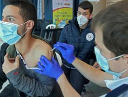 تطعيم العمال الفلسطينيين