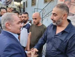 اشتية وفتحي خازم.jpg