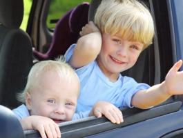 kids-2-in-minivan-shutterstock_147792323-980x490