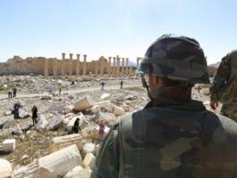 160402112242_soldiers_look_over_damage_at_the_historical_bel_temple_in_the_ancient_city_of_palmyra_in_the_central_city_of_homs_640x360_ap_nocredit