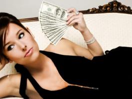 womanwithmoney-980x498