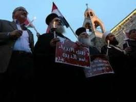 مواطنو بيت لحم ينظمون وقفة مع ضحايا تفجير الكنيستين في مصر.jpg