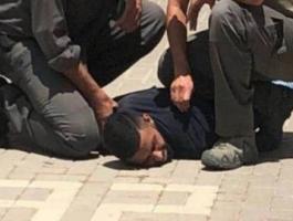اعتقال شاب.jpg