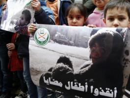 160115024241_placard_depicting_pictures_believed_to_be_for_children_from_the_syrian_town_of_madaya_640x360_epa