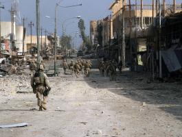 US_Navy__the_1st_Marines,_patrol__through_Fallujah,_Iraq