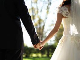 bride-and-groom-holding-hands-featured-w740-493_359079_large