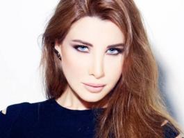 صورة أثارت اعجاب المتابعين لنانسي عجرم وهي ترضع طفلاً !