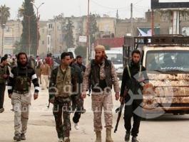 عناصر من المعارضة المسلحة في إدلب