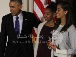 الرئيس الأمريكي باراك أوباما وابنتيه 