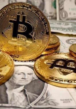 الدولار | يهبط وذرى جديدة للعملات المشفرة