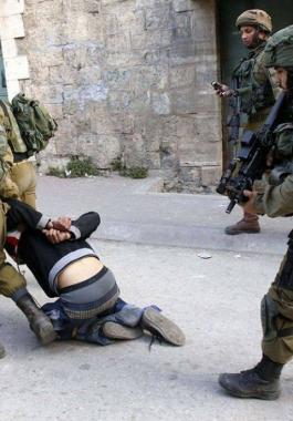 تنكيل بالاسرى.jpg