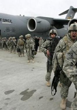 us-soldiers-arrived-from-afghanistan-stand-near-a-plane-at-the-us-airbase-30-km-outside-bishkek-in-manas-air-base