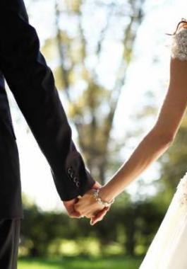 bride-and-groom-holding-hands-featured-w740-493_359079_large