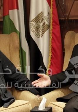 موسى أبو مرزوق وعزام الأحمد 