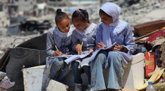 AA-20240904-35560774-35560769-TEACHER_FROM_GAZA_TEACHES_STUDENTS_IN_THE_TENT_SCHOOL.jpg-a340894d-cee3-4c4d-89e4-5ed8bbb4ba43.jpg-10a05ca2-bf28-4bc6-8104-c965f9116ec1.jpg