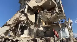 انهيار مبني في قطاع غزة