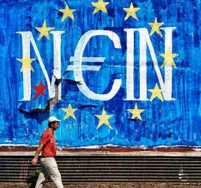 اليونان تتوصل لاتفاق أولي مع دائنيها