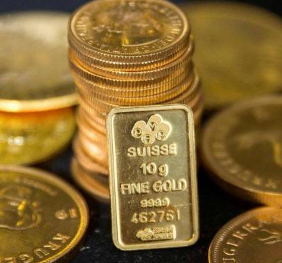 الذهب: يصعد لمستويات قياسية ليلامس أسعار مارس 2014