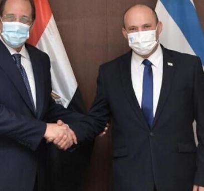 لابيد وعباس كامل.jpeg