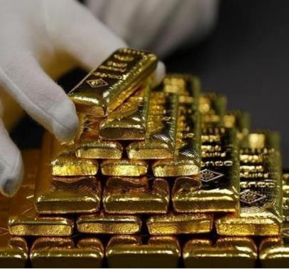 الذهب يتراجع مع تأكيد الفيدرالي على مسار رفع أسعار الفائدة
