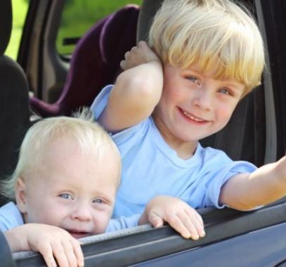 kids-2-in-minivan-shutterstock_147792323-980x490